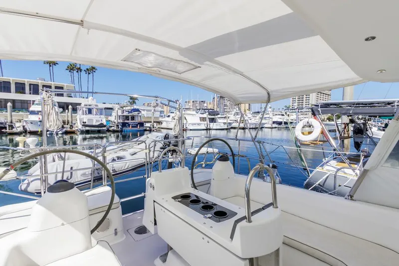 Blue Moon Yacht Photos Pics Cockpit view of 2004 Catalina 400 MkII sailboat docked in a marina.