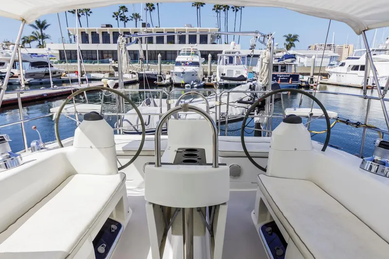 Blue Moon Yacht Photos Pics Cockpit view of 2004 Catalina 400 MkII sailboat docked in a marina.