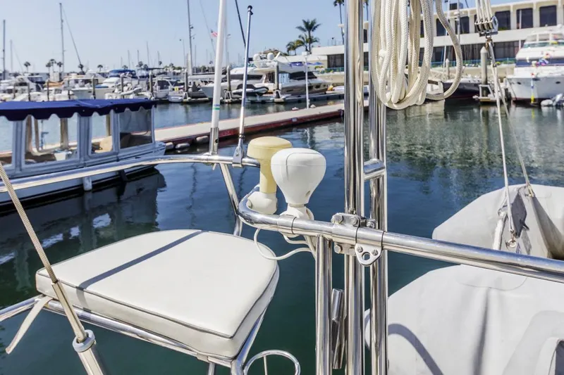 Blue Moon Yacht Photos Pics Sailboat deck view at marina, Catalina 400 MkII, 2004 model, with moored boats in background.