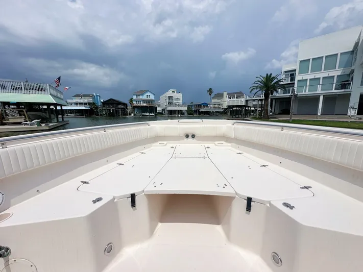  Yacht Photos Pics Grady-White 366 Canyon boat with 2020 Suzuki engines, docked in a residential canal.