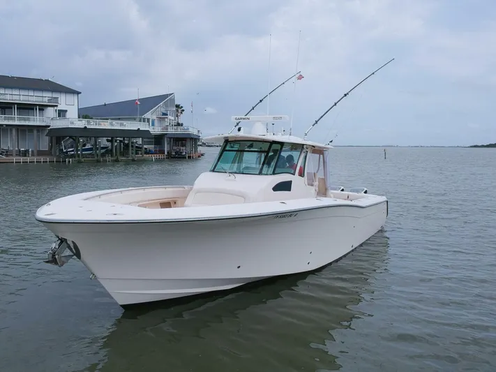  Yacht Photos Pics Grady-White 366 Canyon boat with 2020 Suzuki engines docked in a marina, 2011 model.