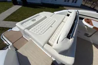 2020 Cobalt R7 Surf boat with luxurious white seating and cup holder.