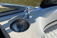 2020 Cobalt R7 Surf boat interior with stainless steel sink and faucet.