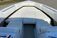 2020 Cobalt R7 Surf boat with luxurious white seating and spacious interior.