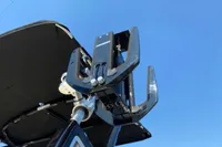 2020 Cobalt R7 Surf boat tower against clear blue sky.