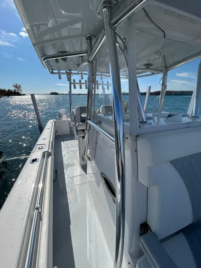  Yacht Photos Pics 2022 Contender 35 ST boat on water, showcasing sleek design and spacious deck.