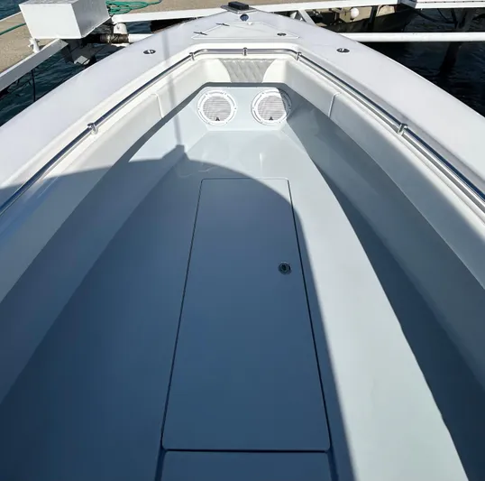  Yacht Photos Pics 2022 Contender 35 ST boat deck with storage compartment and speakers.