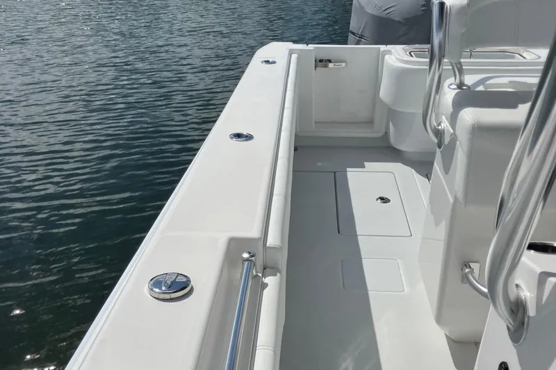  Yacht Photos Pics 2016 Contender 30 ST boat deck with sleek white finish and stainless steel fittings.