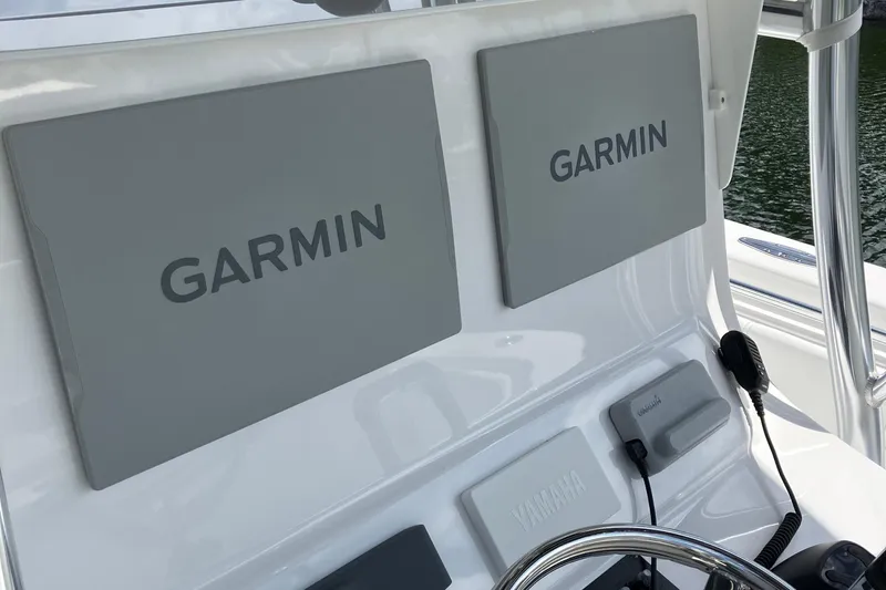  Yacht Photos Pics Console of 2016 Contender 30 ST boat with Garmin navigation displays.