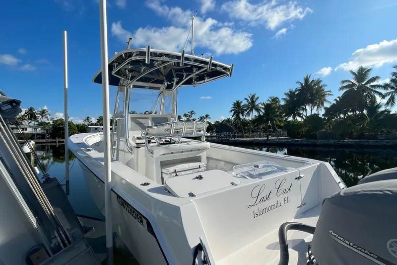  Yacht Photos Pics 2016 Contender 30 ST boat docked in Islamorada, FL, under clear blue skies.