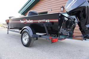 2025 Tracker Bass Tracker Classic XL boat with Mercury engine, parked on a trailer.