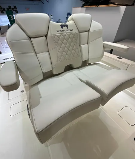 Wcn 55877 280ccx Yacht Photos Pics 2025 World Cat 280 CCX boat seat with white leather upholstery and diamond stitching.