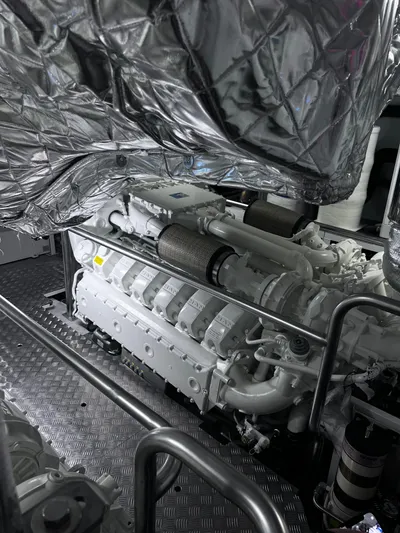  Yacht Photos Pics Engine room of 2023 Azimut Magellano 66 yacht, featuring advanced machinery and insulation.