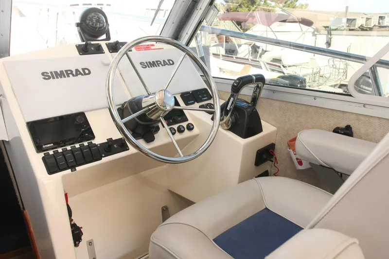  Yacht Photos Pics Interior of 2017 Osprey 30 Fisherman boat with Simrad navigation system.