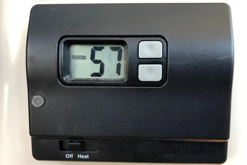  Yacht Photos Pics Digital thermostat displaying room temperature of 57 degrees on Osprey 30 Fisherman, 2017 model.
