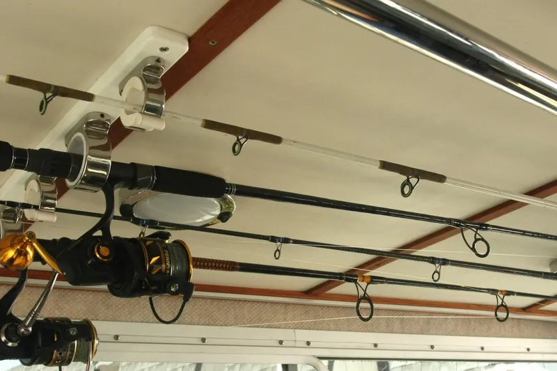  Yacht Photos Pics Fishing rods stored on a 2017 Osprey 30 Fisherman boat ceiling rack.