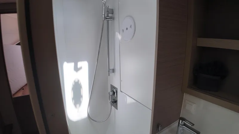  Yacht Photos Pics Modern shower area in 2023 Lagoon 40 yacht bathroom.