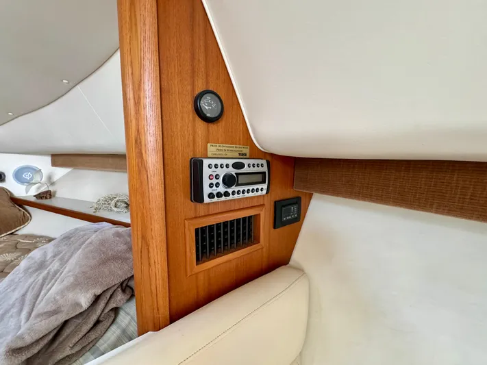 Castaways Yacht Photos Pics Interior of 2006 Tiara Yachts 29 Open, featuring control panel and wood finish.
