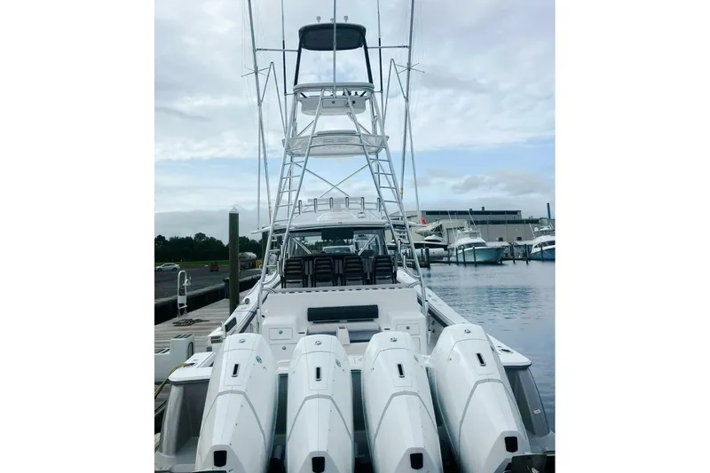  Yacht Photos Pics 2024 Valhalla Boatworks V-55 with multiple engines docked at marina.