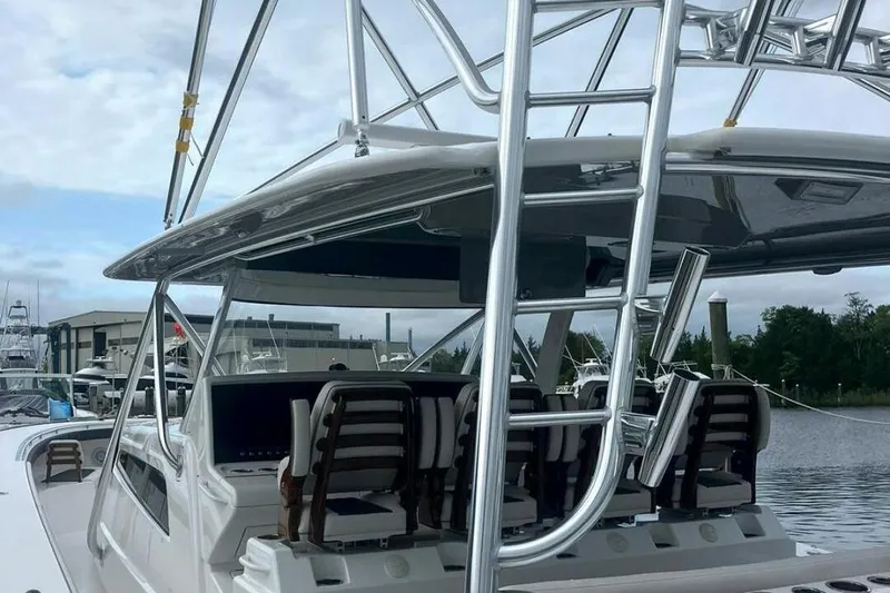  Yacht Photos Pics 2024 Valhalla Boatworks V-55 with sleek design and modern features docked at marina.