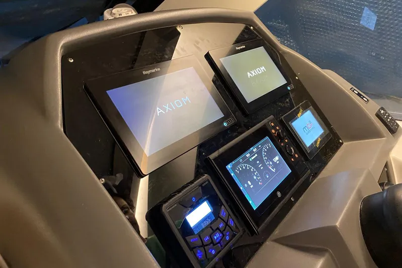 Yacht Photos Pics Control panel of 2026 Hanover 375 with multiple digital displays and navigation systems.