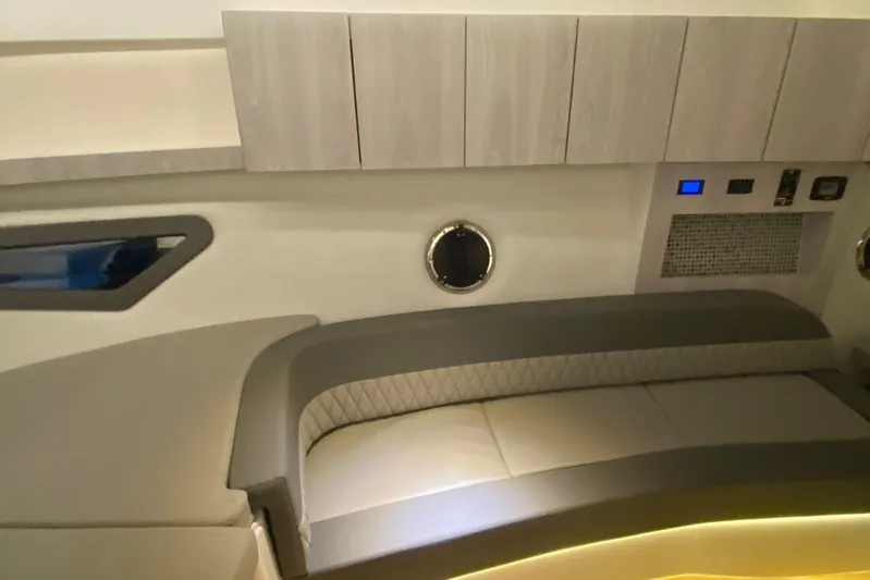  Yacht Photos Pics Luxurious interior of 2026 Hanover 375 with modern seating and sleek cabinetry.
