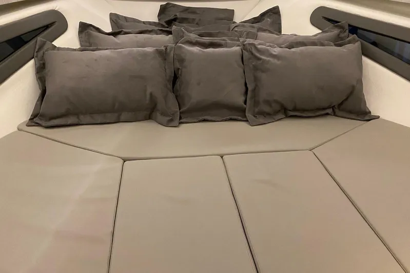  Yacht Photos Pics Luxurious interior seating with cushions in a 2026 Hanover 375 model boat.