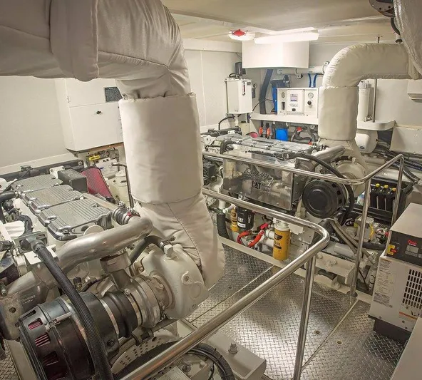  Yacht Photos Pics Engine room of a 2007 Lazzara 68 yacht, showcasing machinery and equipment.