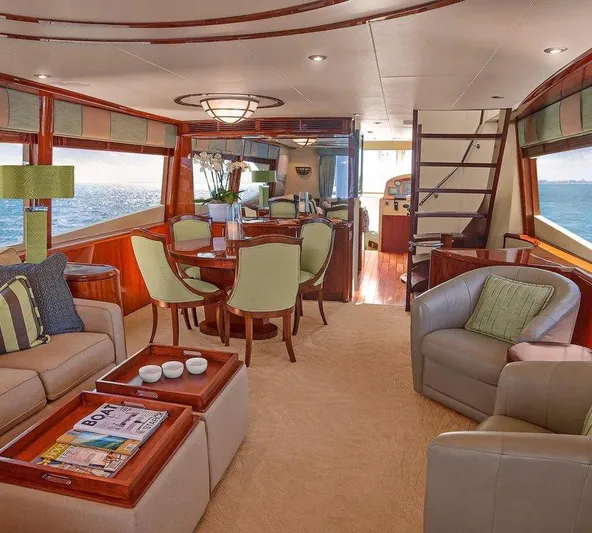  Yacht Photos Pics Luxurious interior of a 2007 Lazzara 68 yacht with elegant seating and dining area.