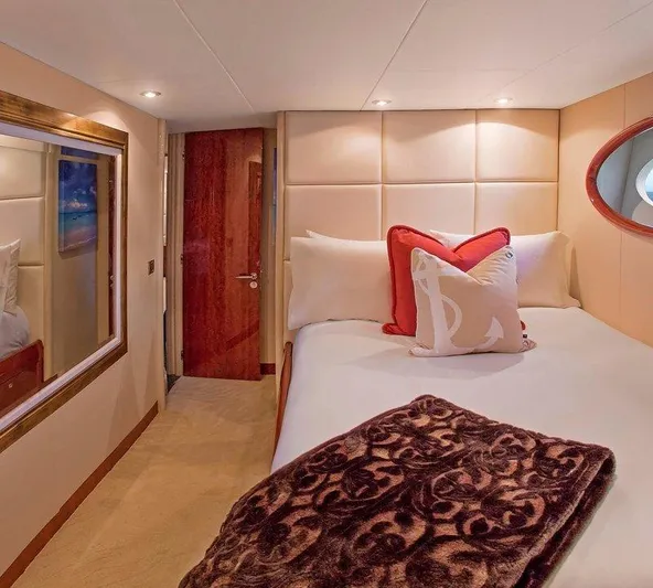  Yacht Photos Pics Luxurious bedroom interior on 2007 Lazzara 68 yacht with plush bedding and elegant decor.