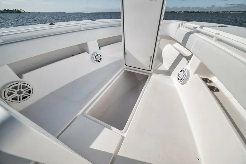  Yacht Photos Pics 2018 Invincible 36' Open Fisherman boat interior with storage and speakers.