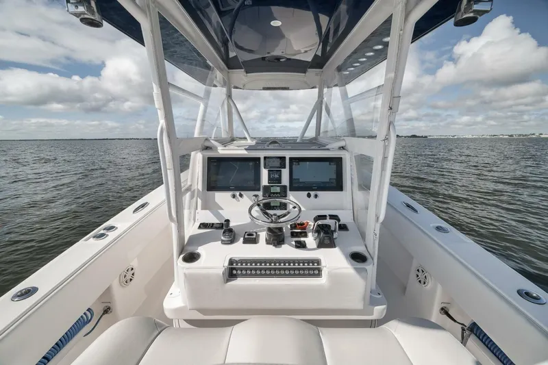  Yacht Photos Pics 2018 Invincible 36' Open Fisherman boat cockpit with advanced navigation systems.