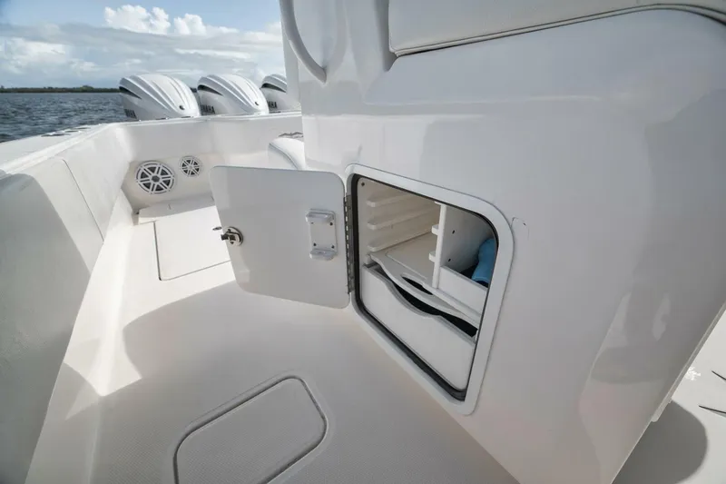  Yacht Photos Pics 2018 Invincible 36' Open Fisherman boat with open storage compartment and Yamaha engines.