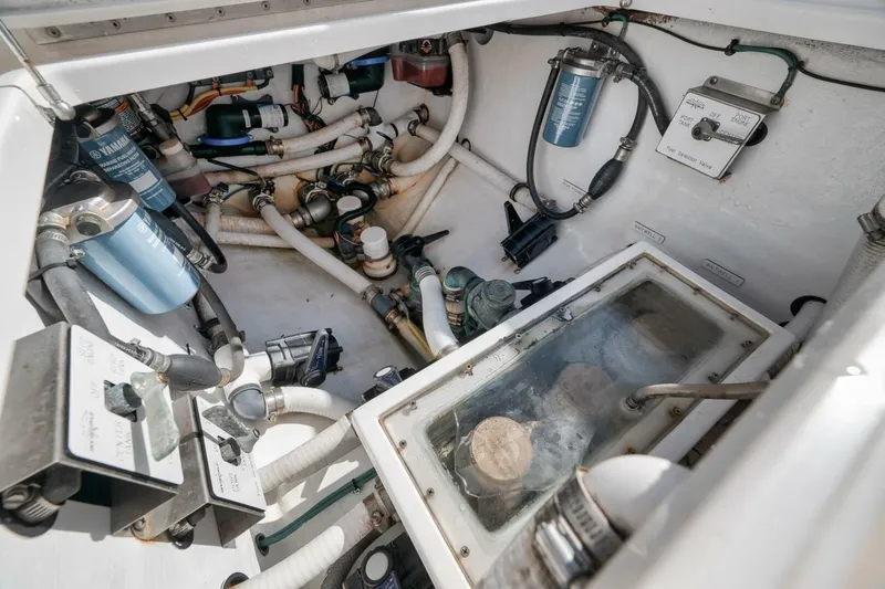  Yacht Photos Pics Engine compartment of 2018 Invincible 36' Open Fisherman with visible filters and hoses.