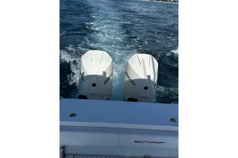  Yacht Photos Pics 2024 Southport 30 FE boat with dual Mercury Verado engines on open water.