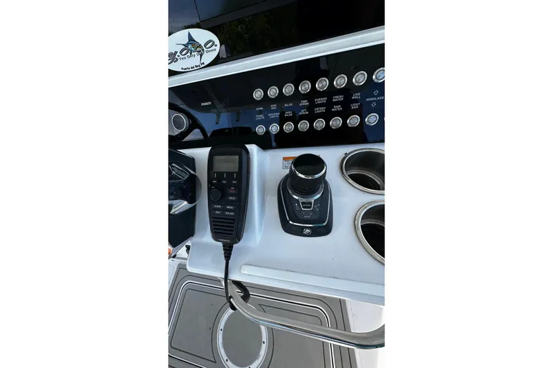  Yacht Photos Pics 2024 Southport 30 FE boat console with controls and cup holders.