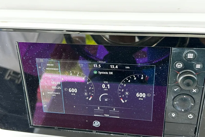  Yacht Photos Pics 2024 Southport 30 FE dashboard display showing engine metrics and maintenance information.