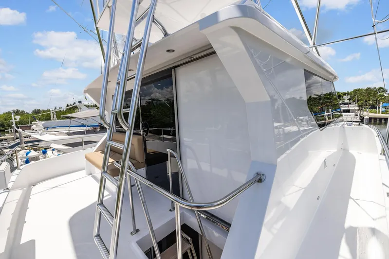 Party's Over Yacht Photos Pics 2006 Northstar Enclosed Flybridge yacht with sleek design and modern features.