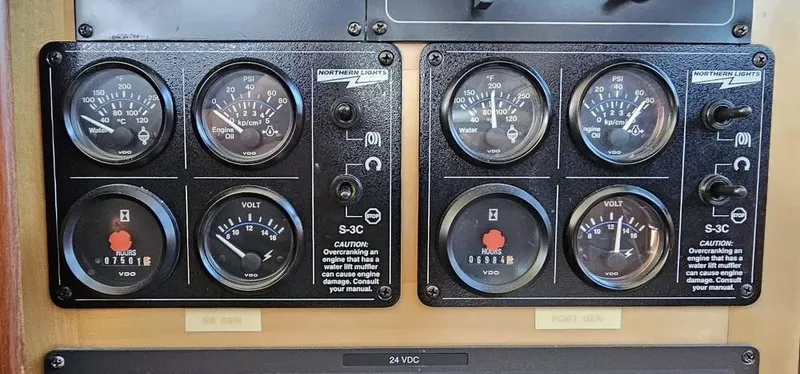 Party's Over Yacht Photos Pics Control panel of a 2006 Northstar Enclosed Flybridge with gauges and indicators.
