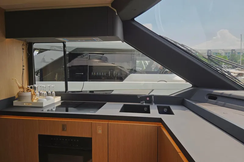  Yacht Photos Pics Interior view of 2025 Azimut Seadeck 7 yacht kitchen with modern design and sleek finishes.