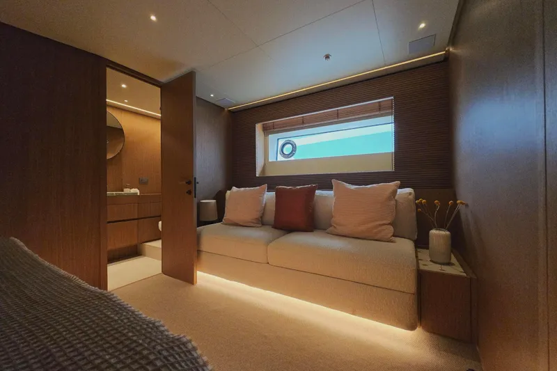  Yacht Photos Pics Luxurious interior of 2025 Azimut Seadeck 7 yacht with cozy seating and elegant decor.