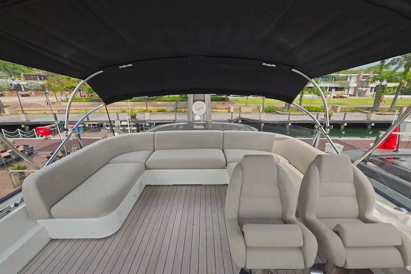  Yacht Photos Pics Luxurious seating area on 2025 Azimut Seadeck 7 yacht with modern design.