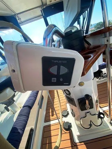 Patience Yacht Photos Pics Control panel on 1989 Irwin 54 sailboat, featuring thruster controls and teak deck.
