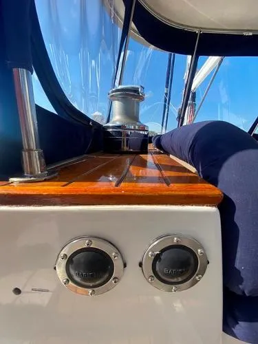 Patience Yacht Photos Pics 1989 Irwin 54 sailboat deck with winch and polished wood finish.