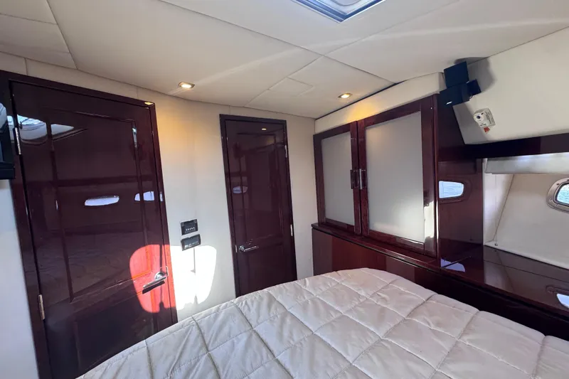  Yacht Photos Pics Luxurious interior of 2011 Sea Ray 540 Sundancer yacht with elegant wood finishes.