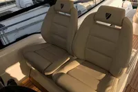 Luxurious seating on 2018 Fairline Targa 48 Open yacht, featuring beige leather upholstery.