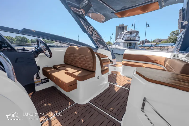  Yacht Photos Pics 2024 NX 280 Xtreme yacht interior with luxurious seating and modern design.