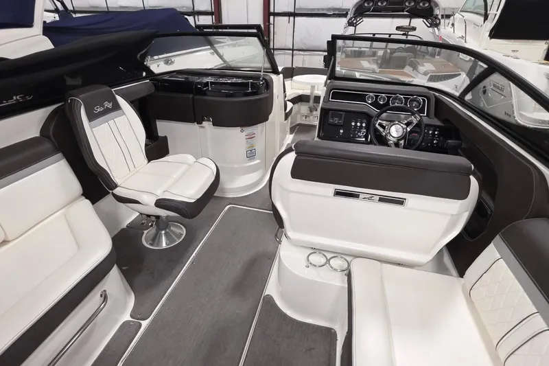  Yacht Photos Pics 2017 Sea Ray SLX 280 boat interior with luxurious seating and modern dashboard.