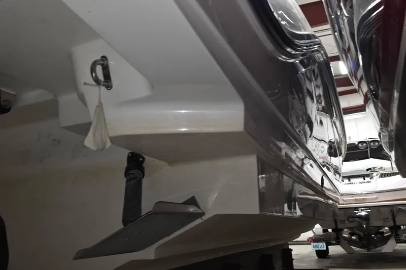  Yacht Photos Pics 2017 Sea Ray SLX 280 boat hull in storage, showcasing sleek design and structure.