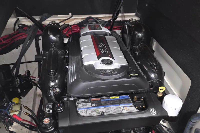  Yacht Photos Pics Engine compartment of a 2017 Sea Ray SLX 280 boat, featuring a Mercury 6.2L engine.